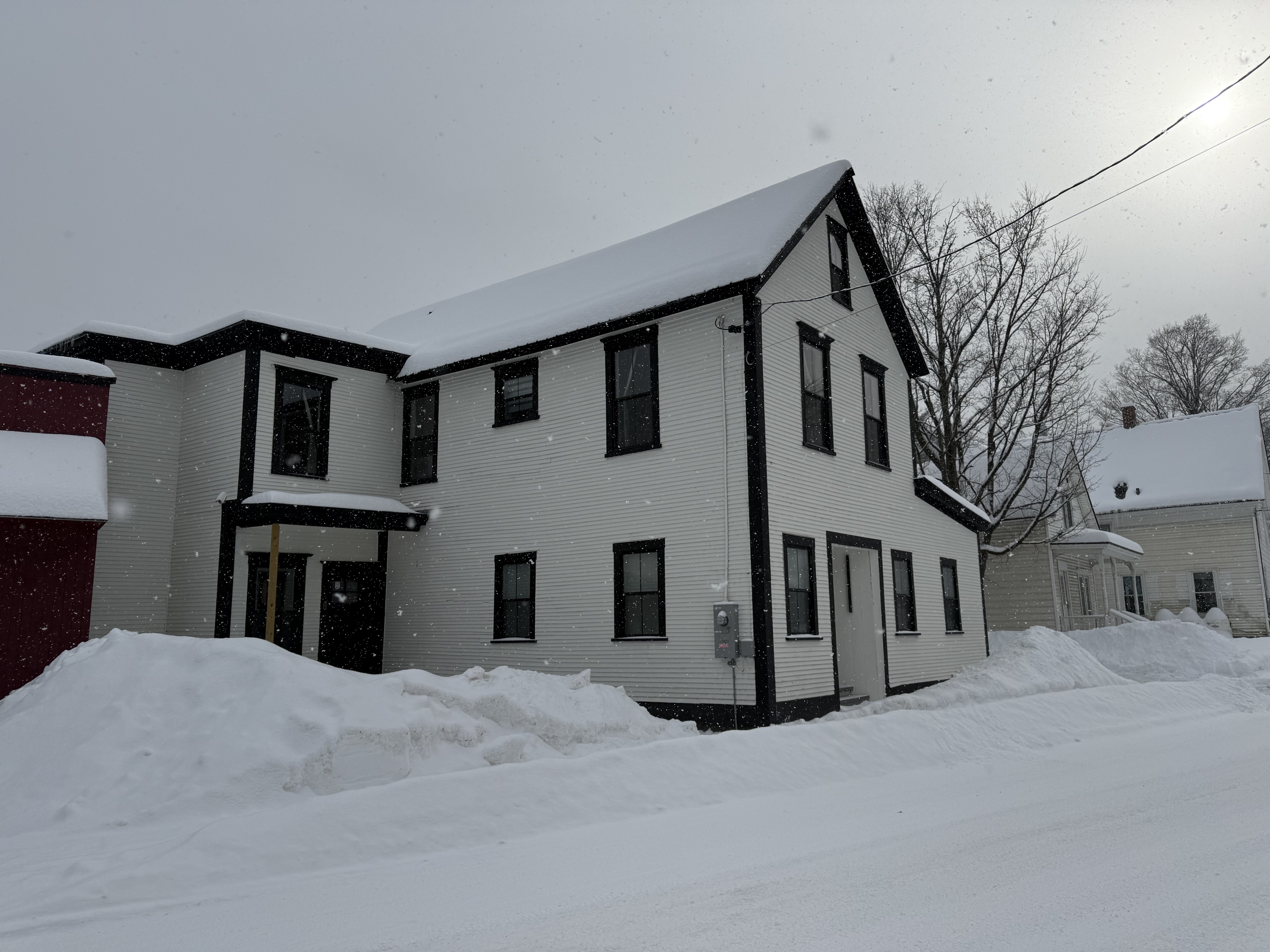 Side view of the house in snow