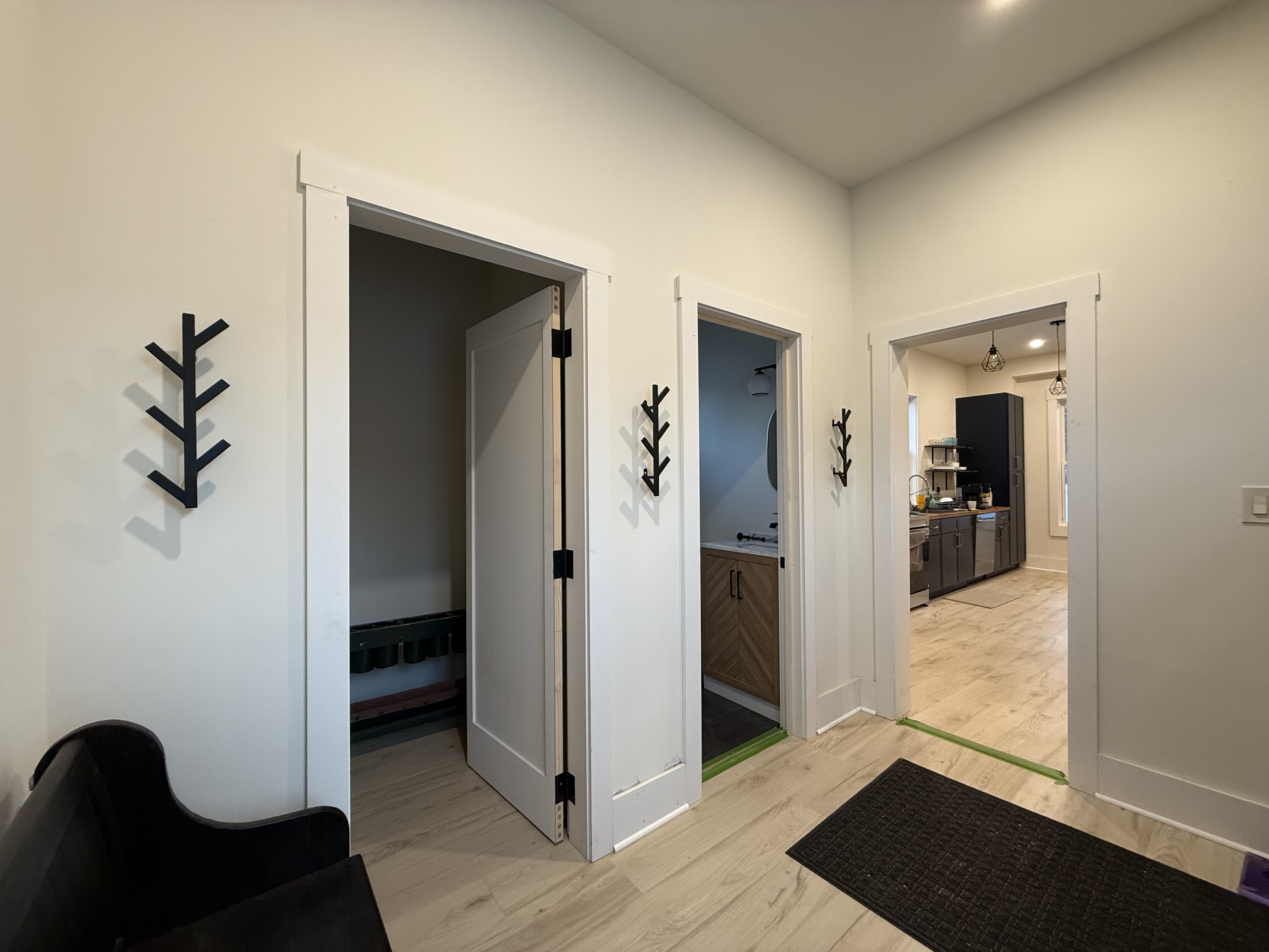 Mudroom with bench and coat hooks