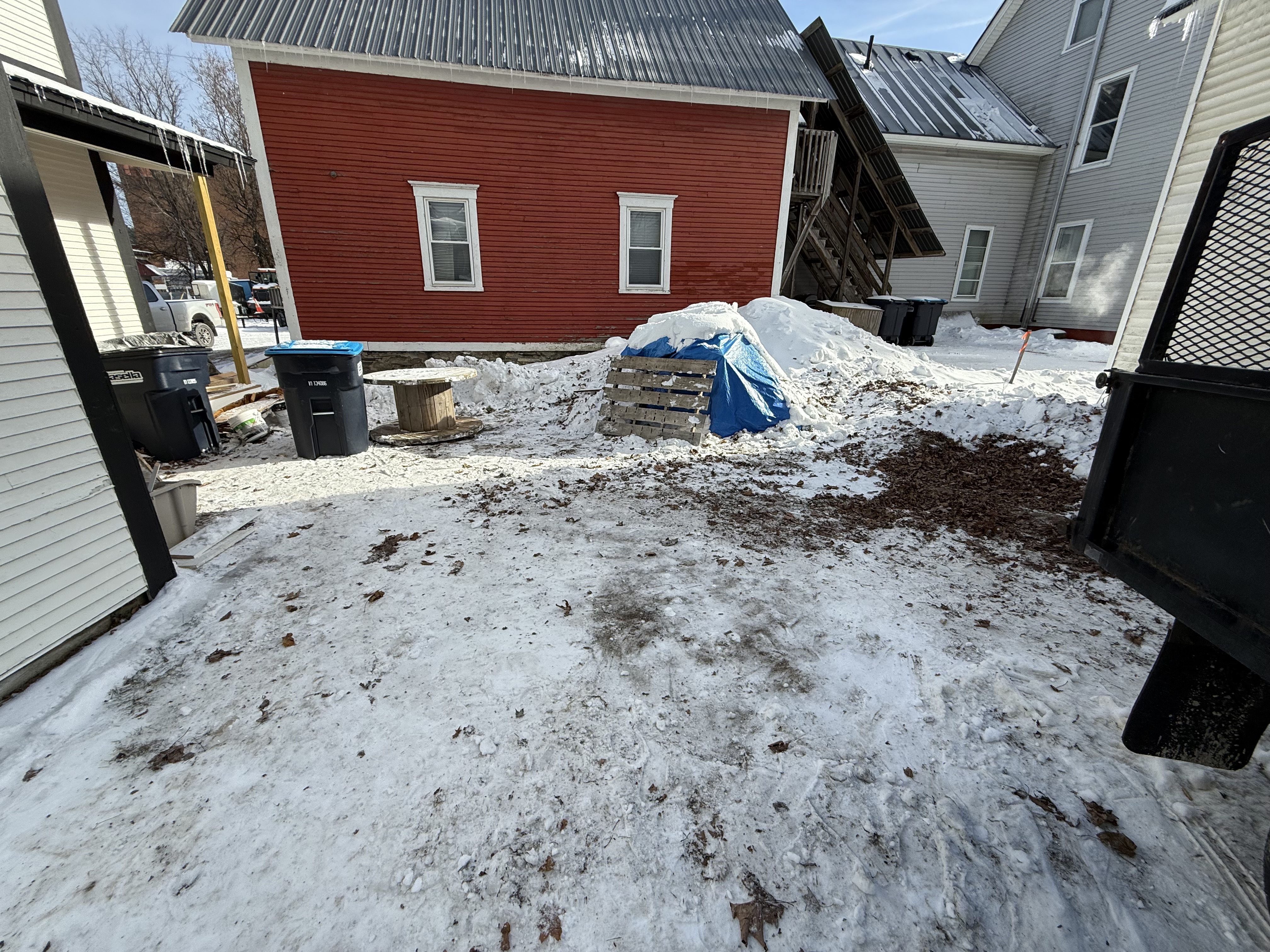 Parking area behind the house